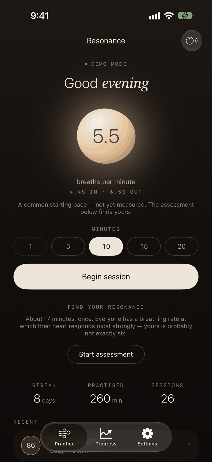 The same Practice screen in the dark look, Ember: a warm brown-black ground, ivory type and a honey-lit stone.
